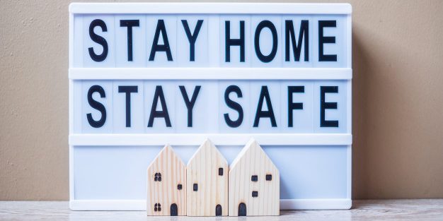 lightbox-with-text-stay-home-stay-safe-table_42256-2231