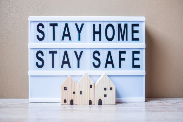 lightbox-with-text-stay-home-stay-safe-table_42256-2231